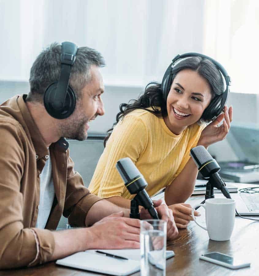 Podcast hosts recording an interview